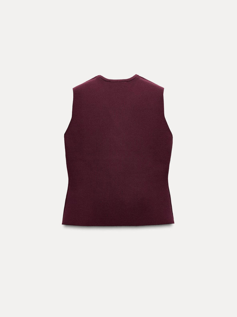 Knitted Vest and Pleated Skirt