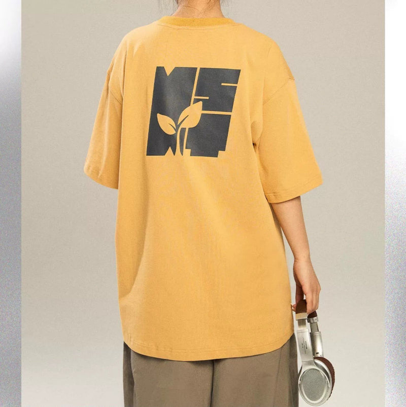 T-shirt With Growing Plant Design