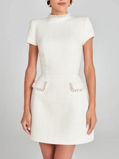 Exquisite and Playful Pearl Trim Pocket Mini Dress