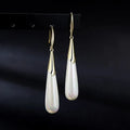 White Dangling Earrings
