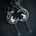 Blue Zirconia Cat Earrings in Sterling Silver