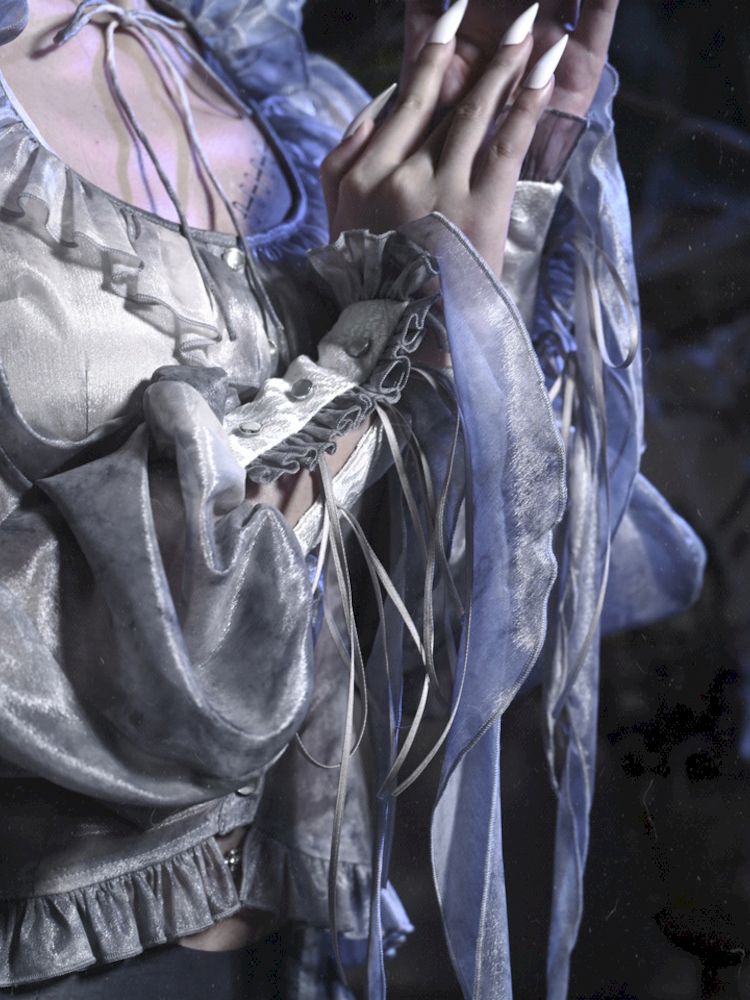Victorian-style Blouse With Ruffled Collar and Billowing Sleeves