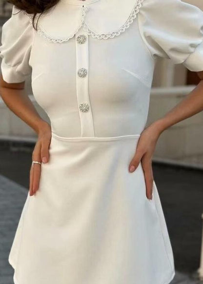 Amelie - Pearl Button Mini Dress