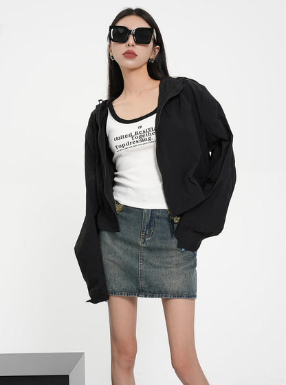 Textured Contrast Duo: Ivory Puff-sleeve Crop Blouse & Black Quilted Bomber Jacket Set