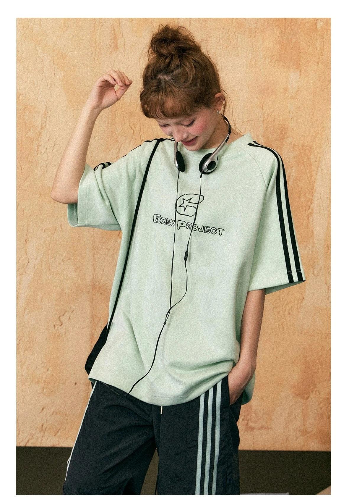 Ezek Free Project Sporty Two-piece Set - Graphic T-shirt and Wide-leg Track Pants