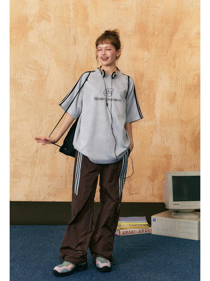 Ezek Free Project Sporty Two-piece Set - Graphic T-shirt and Wide-leg Track Pants