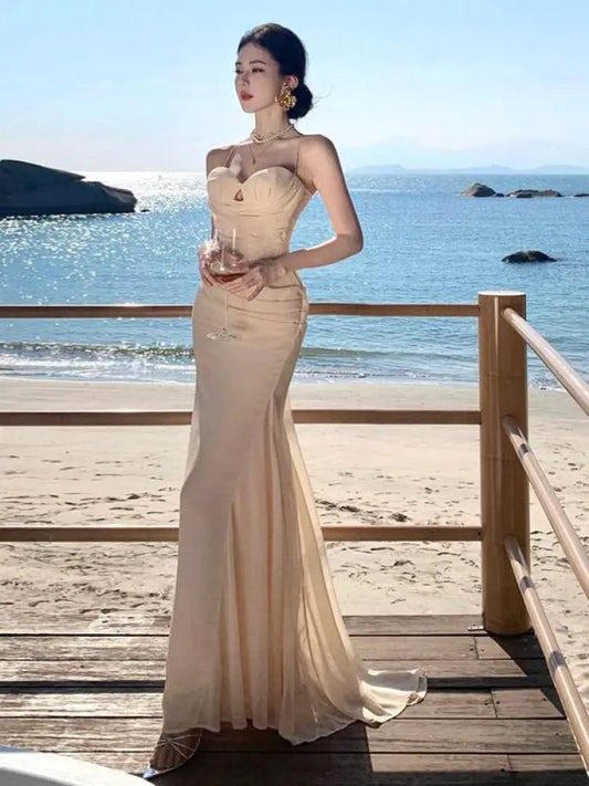 French Summer Beige Club Spaghetti Strap Long Dress V Neck Backless Wrap Hip Pleated Fishtail Evening Dress