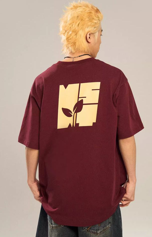 T-shirt With Growing Plant Design