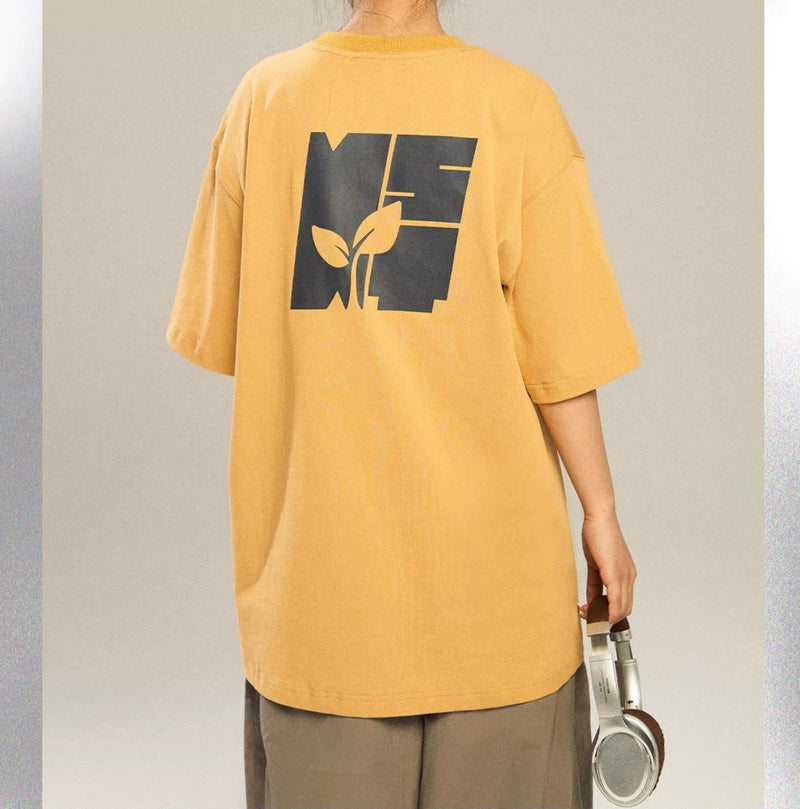 T-shirt With Growing Plant Design