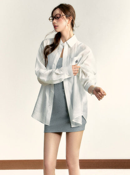 Classic White Long Sleeve Button-down Shirt: Crisp Cotton Collared Blouse With Embroidered Logo