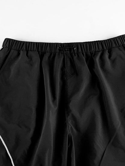 Black Parachute Pants With Cargo Pockets and Piping Detail