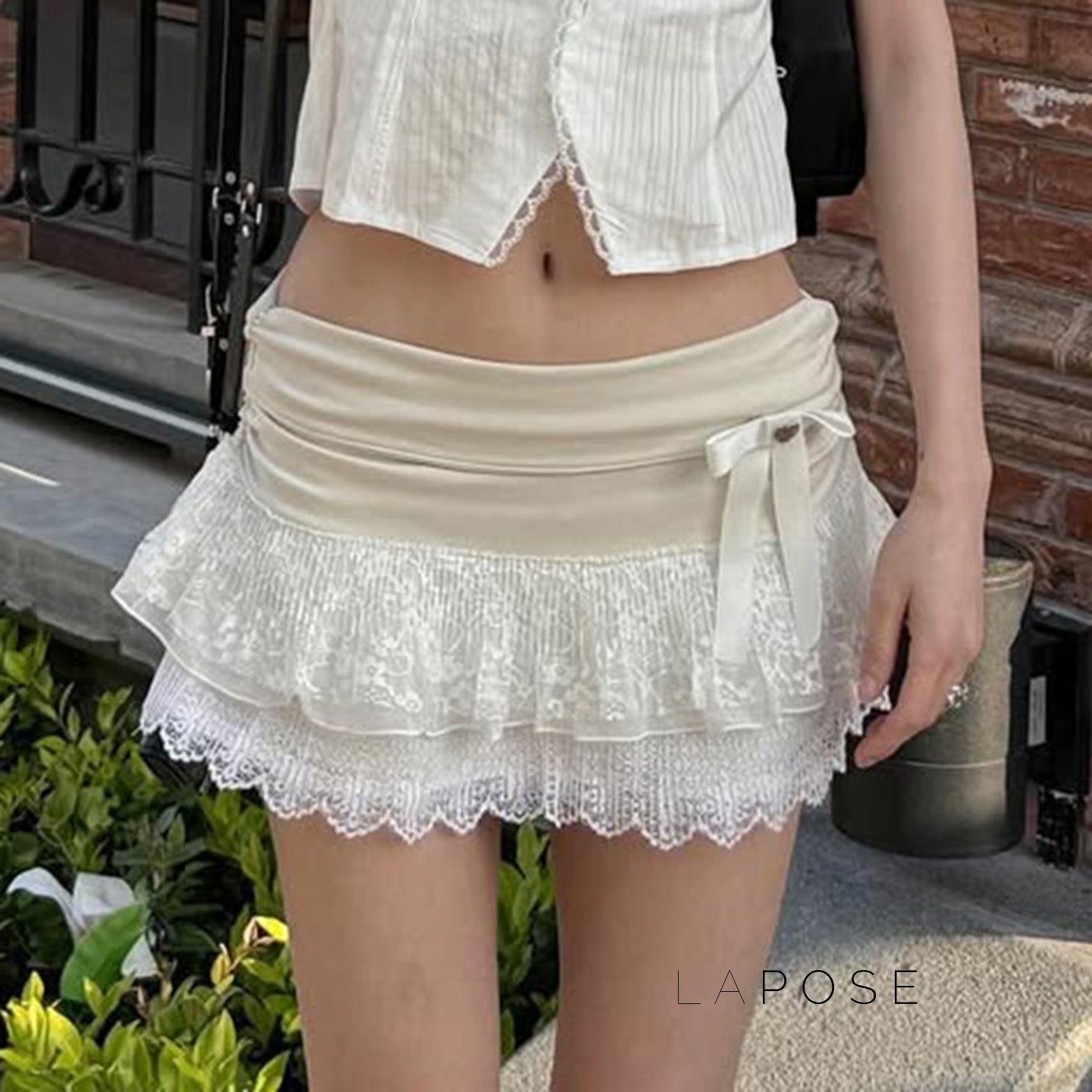 Leylani Bow Tiered Mini Skirt